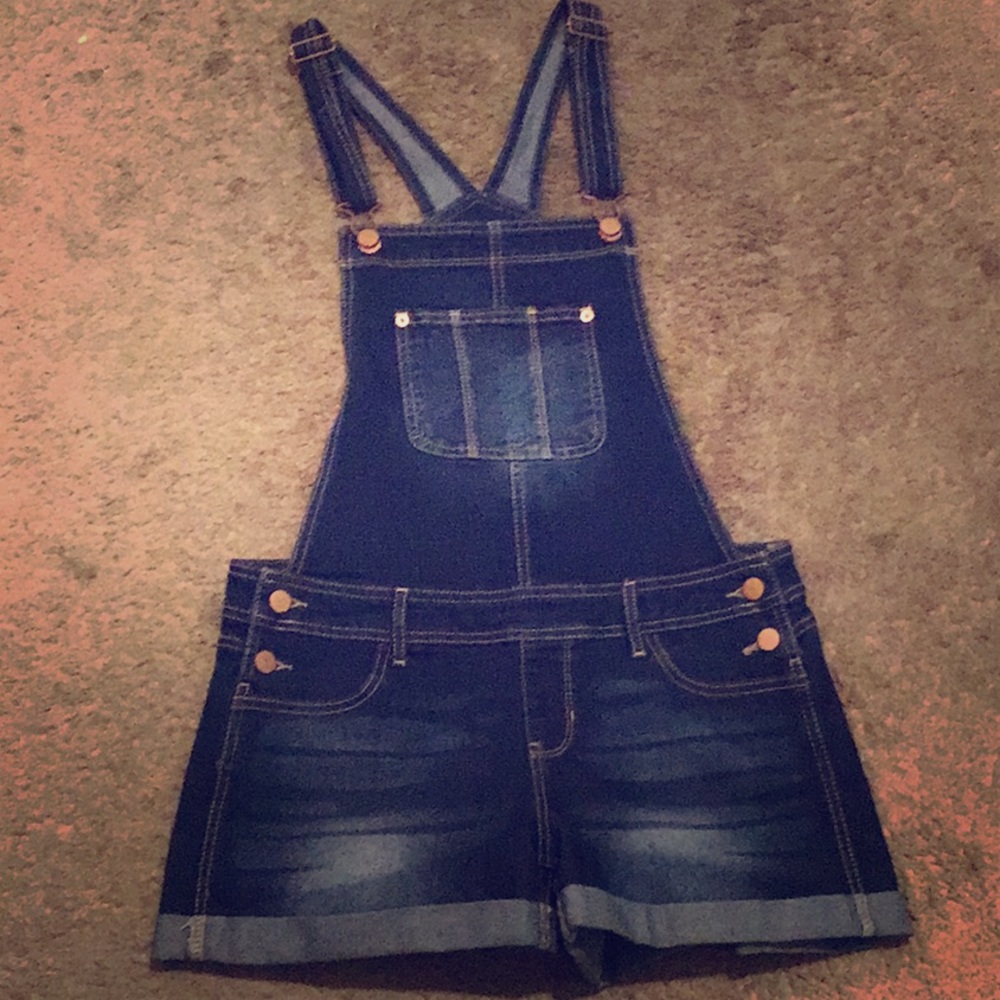 I am selling a very cute short jean romper.